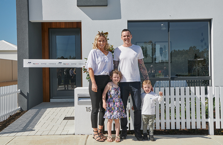 Family outside affordability experiment townhome