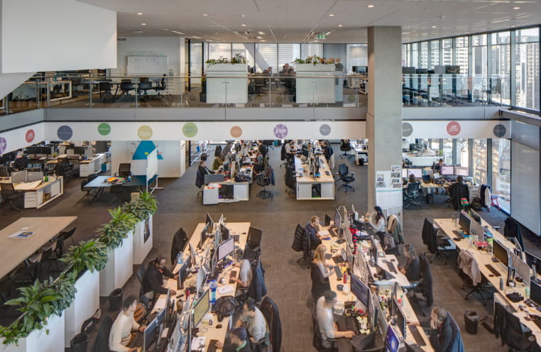 Mirvac team working in large office