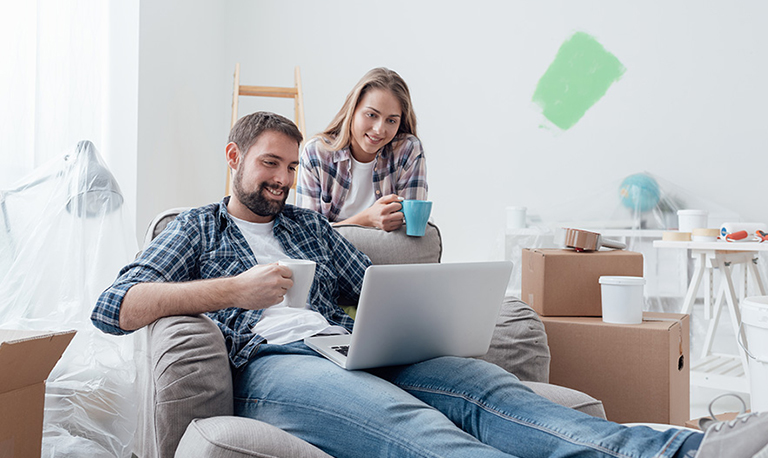 Couple looking at laptop